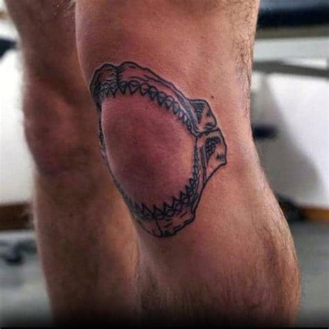 The open jaw is often inked on the knee or elbow and is associated with pain, aggression, and. . Jaw knee tattoo